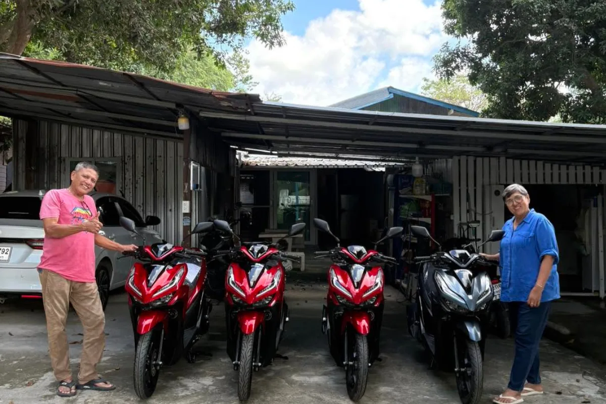 Scooters lined up at a Koh Samui rental shop